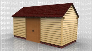 Oak framed three bay store building with a pair of doors to the front.