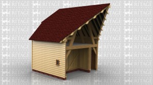 This two storey oak framed home extension is designed to be attached to an existing building. There are two sets of four pane windows to the left side of the building and a two pane window on the first floor. There is a single door for access at the rear and another two sets of two pane windows.