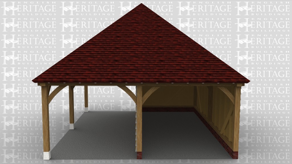 This oak framed garage is formed of two bays, one open and one enclosed. The enclosed bay has three sides and is open to the front, whereas the open bay has no rear, left or front walls.