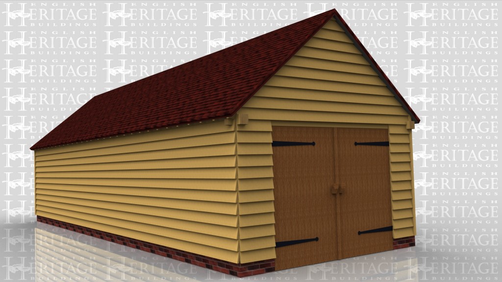 This oak framed garage building is enclosed and access is via a set of garage doors to the left hand side and a single solid door to the front. There are also two sets of three pane windows to the front and a mullion window to the right side.