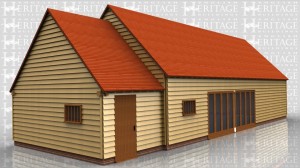 This oak framed garage building is formed of two different frames, the first is a small store accessed by a single solid door to the front and with a mullion window to the side. The second frame is a five bay garage with a high eaves height, due to a sling brace frame. The bays are all enclosed and there are two fully glazed bays to the front, with access via a set of garage doors to the right side.