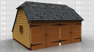 This is an oak frame two bay garage secure with garage doors, with an enclosed logstore to the rear. There is a barn hip at each end and on the right hand side there is a mullion window.