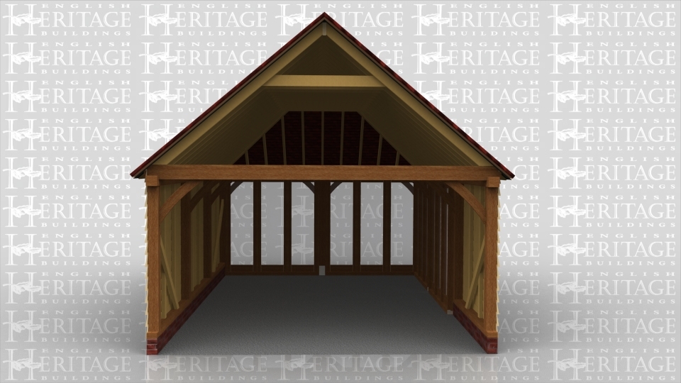 This oak framed building is designed to be attached to an existing building. At the front and right hand side of the building there are two fully glazed units.