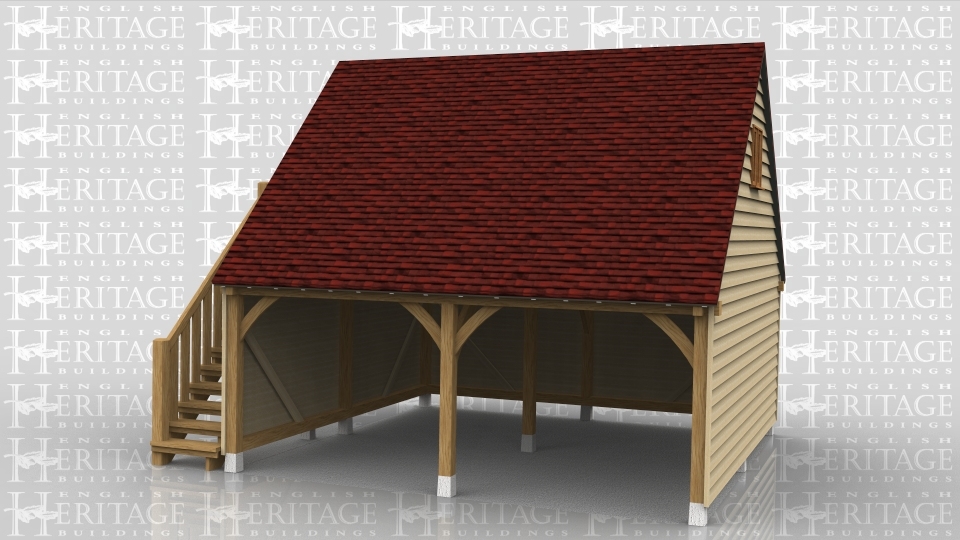 This is an oak framed building with an upper floor which is accessed via the external staircase on the left hand side. The two bays are open and there is a two pane window on the right hand side. There are trimmings for two rooflights on the front of the building to bring in more natural light to the upper floor.