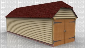 This is a one bay oak framed garage secured with a set of garage doors on each end. There is also a barn hip on each end.