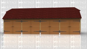 This is an oak framed four bay garage, with each bay enclosed and secured by standard garage doors.There is also an enclosed rear logstore.