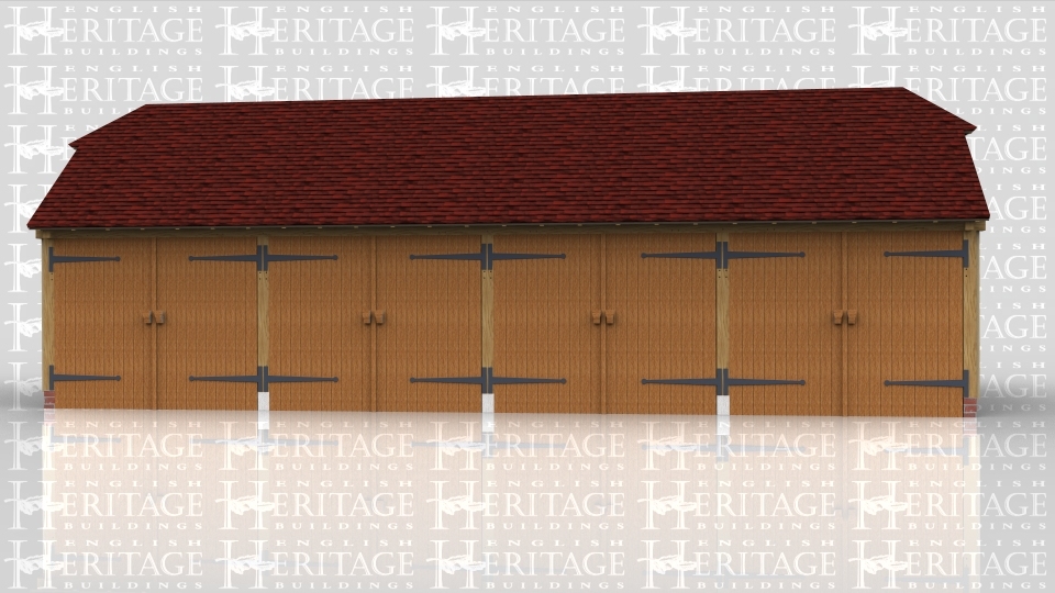 This is an oak framed four bay garage, with each bay enclosed and secured by standard garage doors.There is also an enclosed rear logstore.