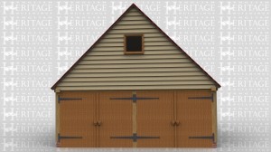 This is an oak framed two bay building with two sets of garage doors on the left hand side and one set of garage doors of the right hand side.