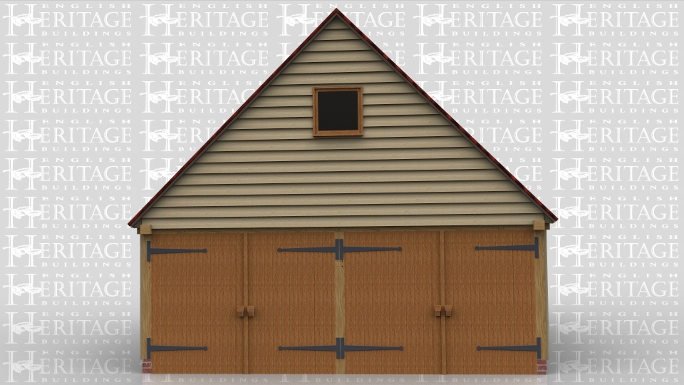 This is an oak framed two bay building with two sets of garage doors on the left hand side and one set of garage doors of the right hand side.