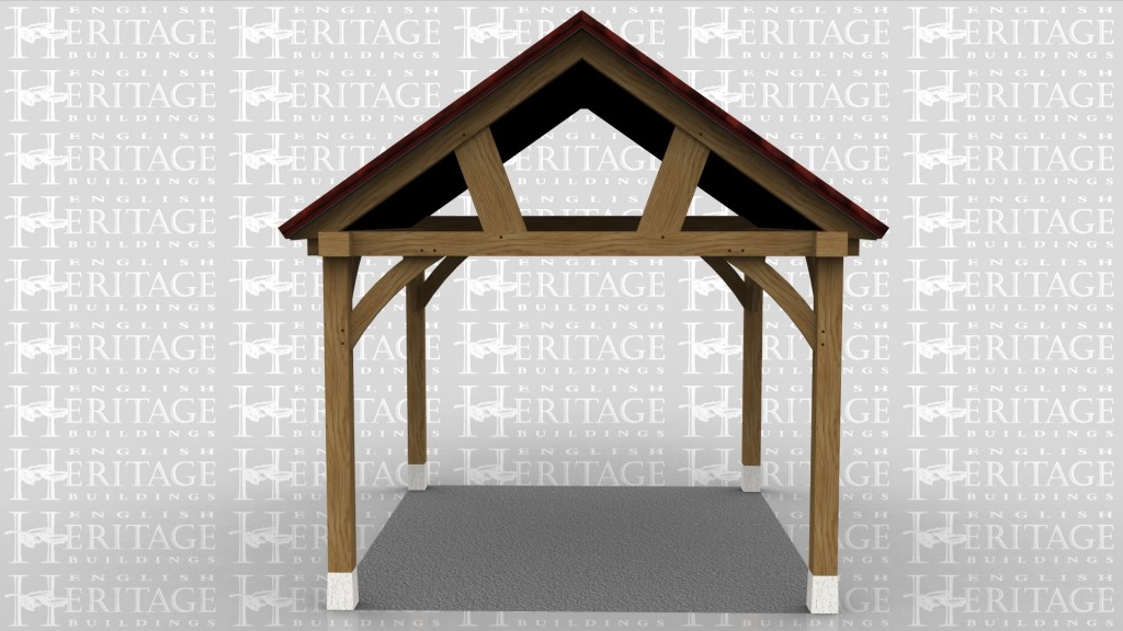 This is an oak framed car port designed to be attached to an existing building.