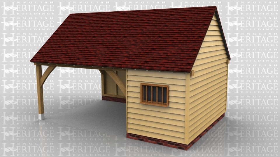 This oak framed two bay garage is formed of one open bay and one enclosed. The enclosed bay is accessed by a single solid door to the left and has a mullion window to the front.