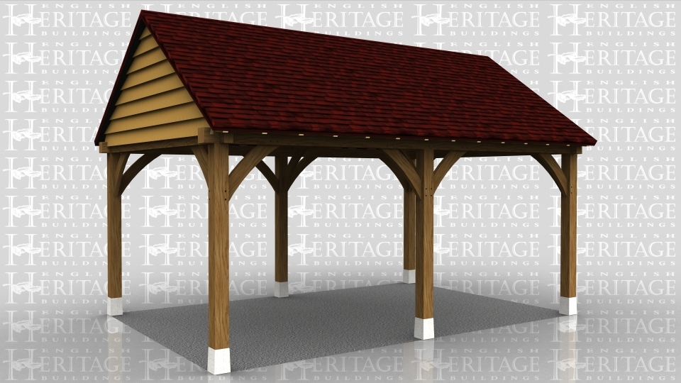 This oak framed car port is formed of two bays, both open to the front, rear and sides.