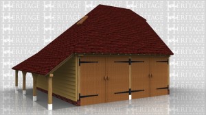 A 2 bay oak framed garage with an external staircase providing access to the upper floor which has 2 roof lights.