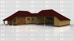 An L shaped oak framed garage. Part of the building has two open bays and the other part has an enclosed studio space enclosed by large barn doors. Both buildings use single windows to allow natural light.