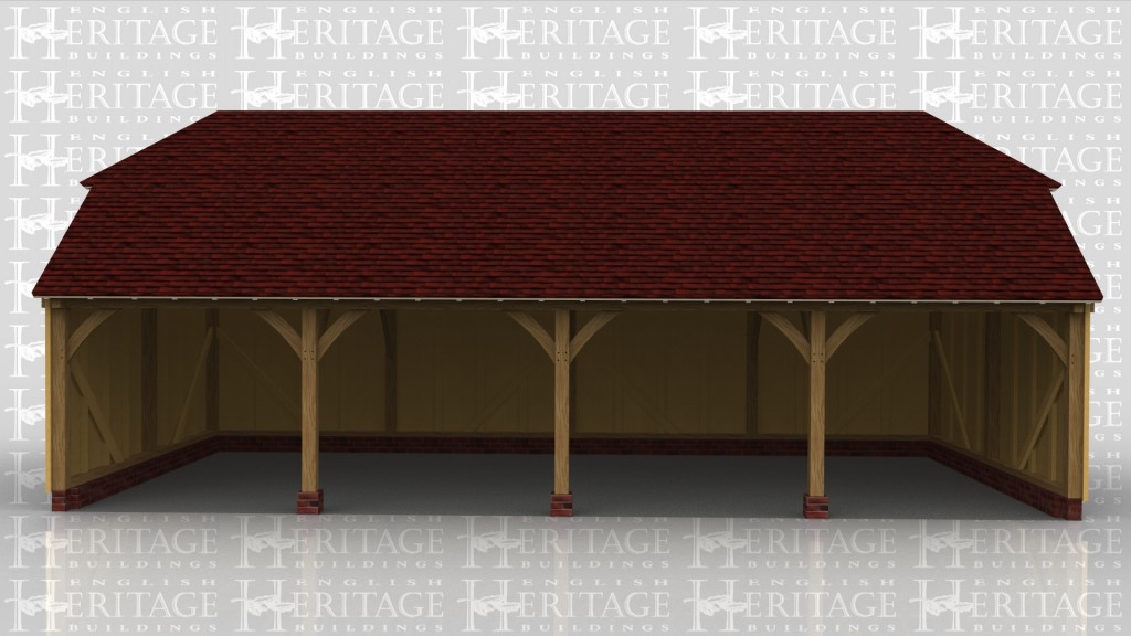 A simple oak framed garage with 4 open bays.