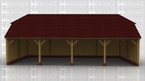 A simple oak framed garage with 4 open bays.