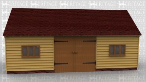 A simple oak framed building with a set of barn doors to a large open space.