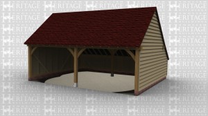 An oak framed garage with two parking bays.