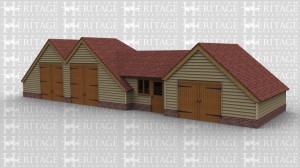 An oak framed barn with two main sections. First area has two large barn doors and connects to the other by a link building with a door, the other section having another set of barn doors. Whole of building has roof lighting to create natural lighting.