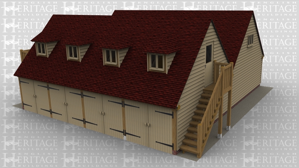 Two adjoining 4 bay oak framed buildings, both with upper floors. One building has four sets of garage doors, with an exterior staircase leading up to the first floor with four dormer windows. There is an external balcony linking the upper floors and 2 rooflights in the second building.