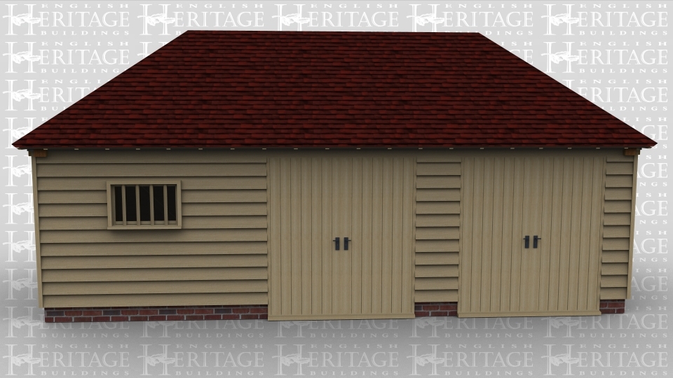 An oak framed out building with both personel and barn doors for ease of access.