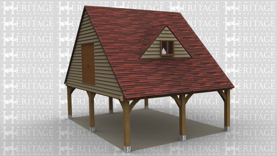 An oak frame home extension with the ground floor completely open and the first floor has a dormer window and a large barn door.