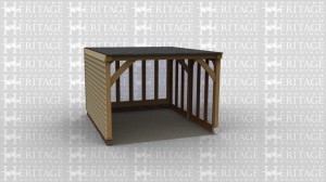 An oak frame home extension with full height glazing down 2 sides and a flat roof