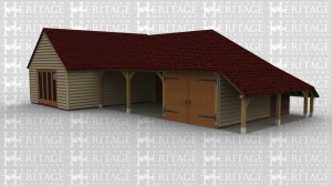 A 3 bay oak frame  garage with 2 open ended bays and an enclosed one with  barn doors, this building also has log store to the right . There is also studio / workshop attached in which there is full height glazing along one wall and 2 smaller windows on another.