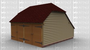 A traditional 2 bay oak frame garage with barn doors.