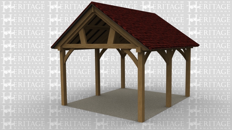 An oak framed open car port with feature trusses.
