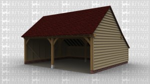 A 2 bay oak frame garage with an enclosed aisle at the rear.