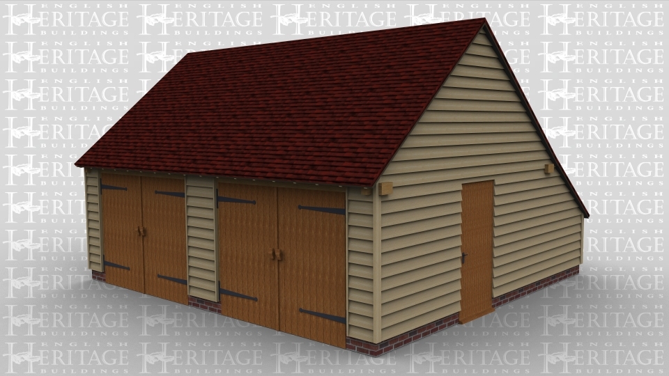 A 2 bay oak frame garage with a pair of garage doors at the front of each bay and personel door to the right wal, this building also has an enclosed aisle at the rear.