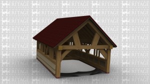 An oak framed boathouse with balustrade to both sides.