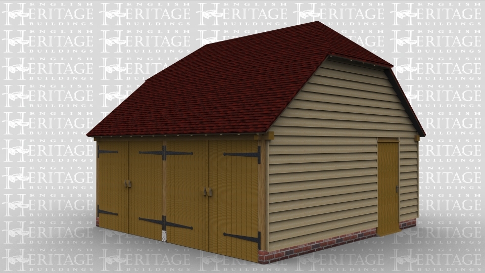 A two bay oak framed garage with both bays enclosed by iroko garage doors. This building also has a door on the right hand side and two barn hip style roof ends.