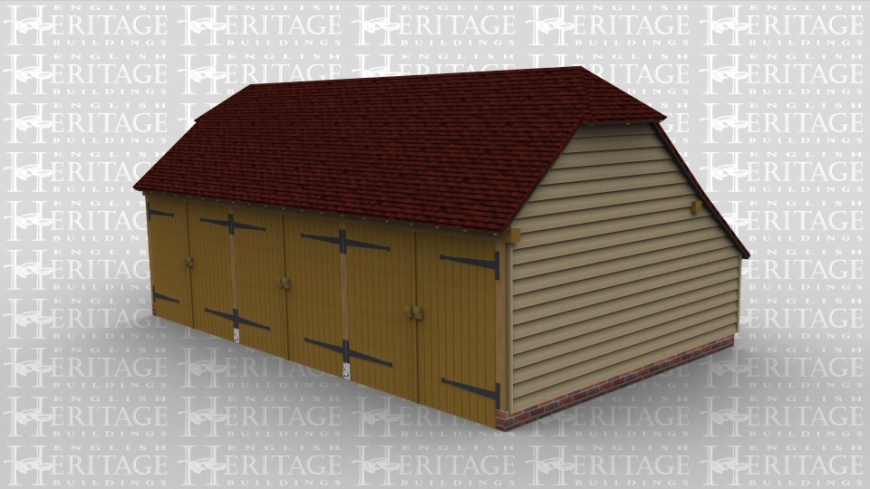 A three bay oak framed garage with a set of garage doors on the front of each bay and barn hips on both the left and right side.