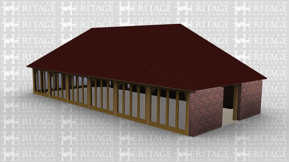 A six bay oak frame building with full height glazing along  the entire front wall and also partially along the left wall. This building has brick walls all around  with an opening on the right to allow the frame to attach to an existing building, the rear of the building has four separate single pane full height glazed windows.