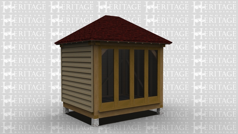 A single bay oak framed building with full height glazing along one wall and with a full hip roof on both the left and right