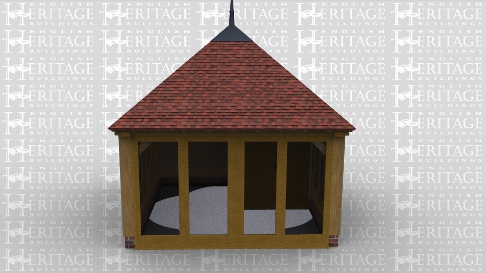 A single bay oak framed building with full height galzing on one wall and a steel finial on the top.