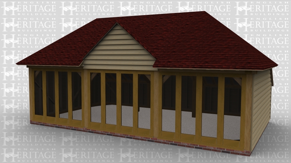 A three bay oak framed leisure building with full height glazing along the entire length of the front with a full hip roof on the left and right of the building and a barn entrance dormer on both the front and the back.