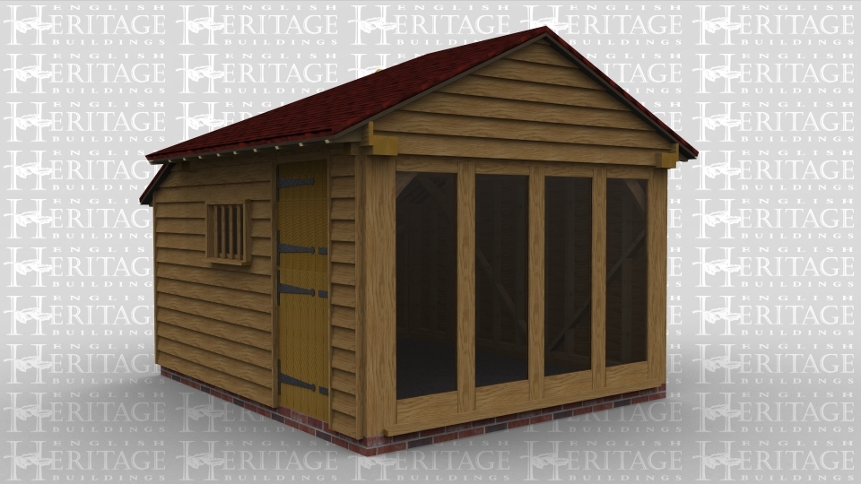 A 2 bay oak frame building with oak weatherboarding and a mullion window on the front as well as a stable door. on the right of the frame there is full height glazing along the whole wall. and the roof has a single velux rooflight.