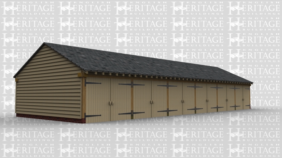 A 6 bay oak frame garage with a set of garage doors at the front of each bay