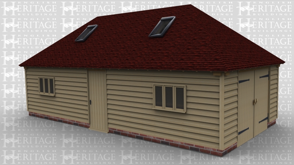 A 3 bay oak framed garage / workshop with two 3 light windows at the front as well as a single door while above there are 2 velux rooflights. On the right side of the building is a pair of garage doors.