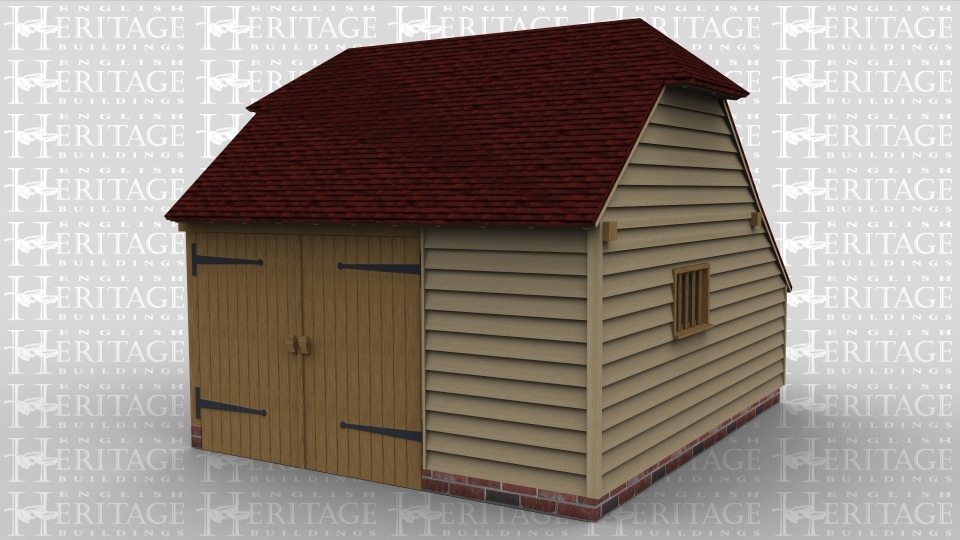 A 2 bay oak framed garage with a pair of oak garage doors at the front and barn hip on both the left and right with a mullion window on the right wall.