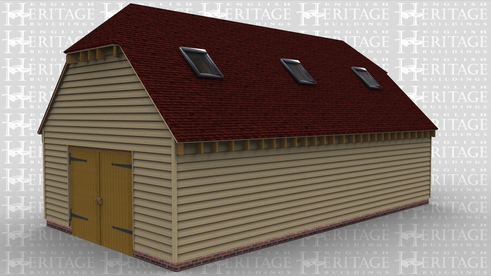 A 3 bay oak framed building with a pair of iroko garage doors on both the left and right hand side  while the front is entirely weatherboarded and has 3 large rooflights to allow plenty of natural light into the building, at the rear there is an external aisle across 1 of the bays possibly as a logstore.