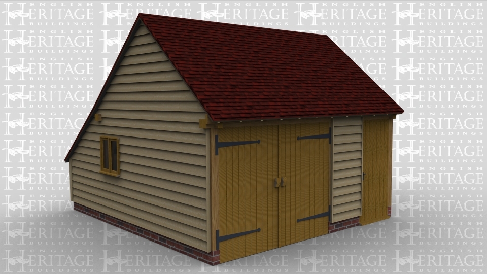 A 2 bay oak framed garage with a pair of iroko garage doors at the front of one bay and a solid single door at the front of the other, the frame has an internal aisle at the rear and on the right wall is a 2 llight window as well as one on the right.