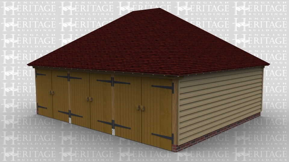 A 3 bay oak framed garage with 3 pairs of iroko garage doors at the front with a full hip roof on both ends.