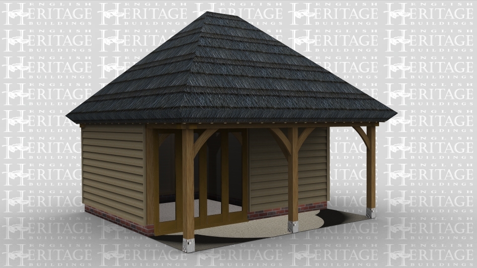 A 2 bay oak framed building with a thatch roof and a set back partition at the front to create a walkway. The front wall has a 4 pane section of full height glazing to allow the natural light into the frame.