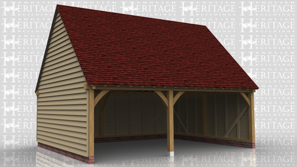 This two bay garage is a full span building with gable ends. Both bays are open at the front although the right hand bay is at its maximum width for extra space on that side.