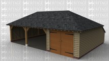 A 3 bay oak framed garage with a full hipped slate roof that has 2 bays open at the front while the third is enclosed with a pair of iroko garage doors, the left and right wall are weatherboarded while the rear has an internal aisle.