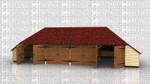4 bay garage with catslides to 3 sides and 4 pairs of garage doors to keep the inside secure.